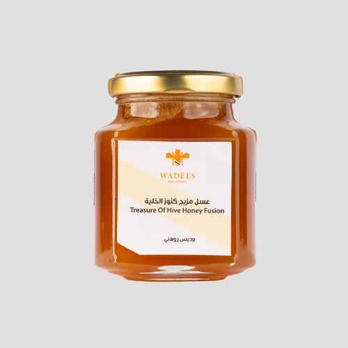 Treasure of Hive Honey Fusion - Description:
This honey is known for its tangy taste and dark color.
It contains a potent mix of Sidr honey, nutrient-rich bee pollen, antiviral propolis, and invigorating royal jelly.Health Benefits:
Enhances male sexual performance and increases sperm count.
Stimulates ovaries and improves fertility in women.
Activates pituitary glands and improves memory and focus.
Antimicrobial and may help relieve hemorrhoids.
Warnings:
Not recommended during pregnancy and breastfeeding.
Propolis may worsen asthma symptoms; not suitable for asthma patients.
Not safe for individuals with high blood pressure.
Best consumed when blood sugar is stable.
Recommended dose: 1 medium spoon mixed with 1/4 cup of lukewarm water.Weight: 275g
