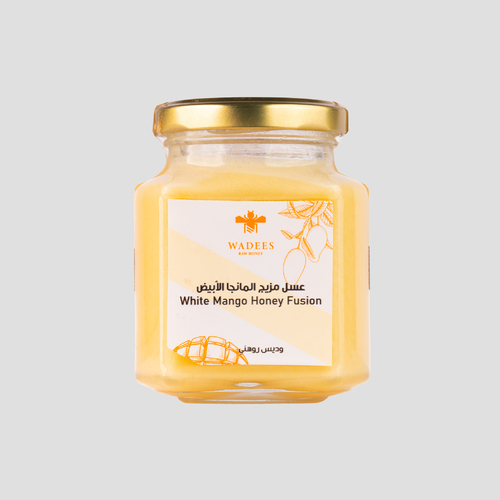 Mango White Honey - Mango blended with white mountain honey extracted from the nectar of lavender and
chamomile flowers from our apiaries in Kyrgyzstan. It is considered a healthy and delicious
alternative to ice cream when chilled. Ingredients: White mountain honey Mango.Benefits: Antibacterial and antifungal. Soothes the throat. Source of energy. Soothes the skin. Rich in antioxidants.
Symptoms: Not recommended for those allergic to honey. How to Use: The honey can be added to various recipes to enhance flavor and add sweetness.