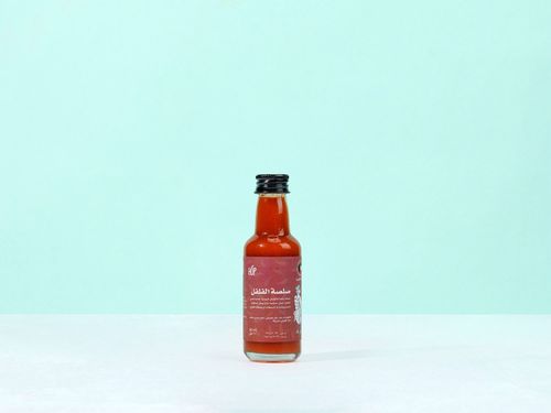 Hot Sauce Kuwaiti - A great addition for daily dishes, especially for chili pepper lovers. Made from fresh Kuwaiti peppers, it adds a spicy and flavorful kick to sandwiches, salads, and your favorite recipes.
Ingredients: Water, natural vinegar, sea salt, spicy Kuwaiti peppers from Almaharah Farms, Kuwaiti paprika. Weight: 60 ml Mild Hot
