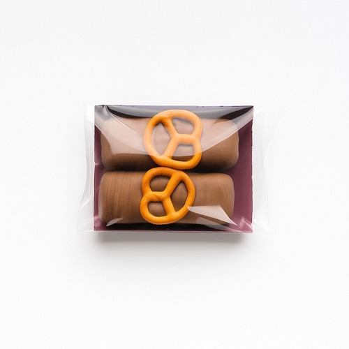 Pretzel bar - Ingredients: unsalted butter, peanut butter, maple syrup, salt, organic stevia, milk powder, pretzels, vanilla protein, unsweetened milk chocolate Nutrition Facts: Serving size 1 bar Calories: 116.4 Fat: 4g Carbs: 4 g Sugar: 2 g Fiber: 0.9 g Protein: 8 g