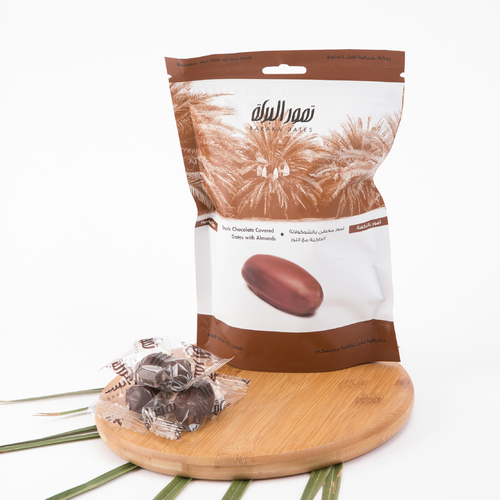 Khudri Almond Dark Chocolate 125g Pouch - The Khudri date is distinguished by its high quality, exceptional nutritional value, and moderately sweet taste. It surpasses others in its ability to maintain quality for a long period and its resistance to heat. Additionally, it is suitable for diabetic patients and is one of the most commonly used dates for stuffing. 
 Packed in a re-sealable pouch.