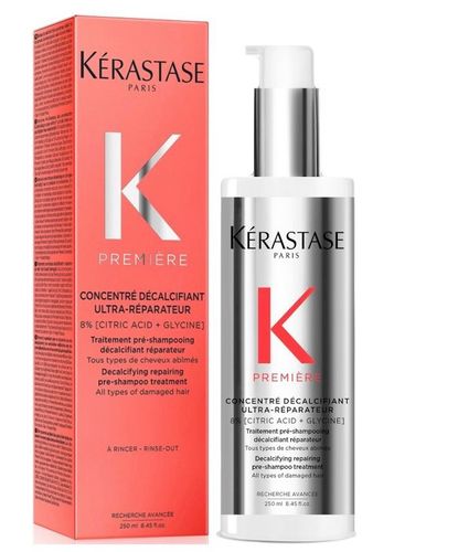 Yasmine Hair Boutique - Kérastase Premiére Concentré Décalcifiant Ultra-Réparateur 250ML - Decalcifying Repairing Pre-Shampoo treatment  All types of Damaged Hair. A professional grade concentration of pure acids to decalcify*.and dramatically reduce persistent damage.Penetrate deep in to the hair to eliminate calcium*overdose,reverse stiffness and dullness,while reconnect broken links between keratin chains*. As a result,hair is stronger,healthier-looking,and shinier-as if renewed. 
 •Apply generously on wet lenghts before shampoo and massage throughout.Leave on for 5minutes. Don't rinse and follow with Premiére Bain directly on top to maximize efficacy.Rinse and follow with Premiére Fondant or Masque.  In case of contact with eyes,rinse them immediately and thoroughly.