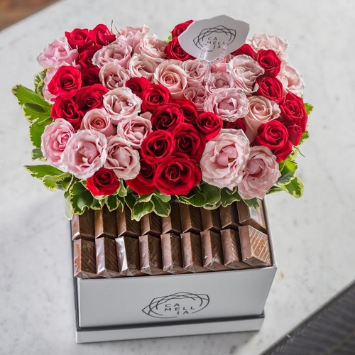 Love Box With Red And Pink Flowers And Chocolate