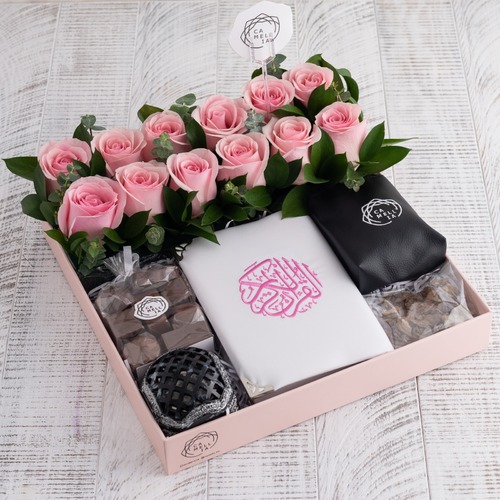 Pink Tray Decorated With Natural Pink Roses Containing A Mushaf, A Chocolate Bag, Incense, A Vaporiz