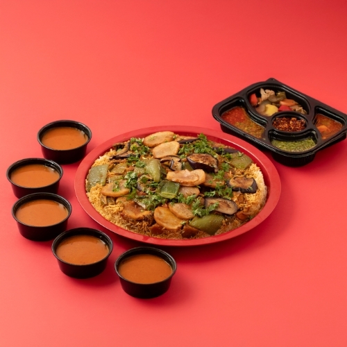 Chicken Maqluba Tray - A traditional Kuwaiti dish made of layers of rice, chicken, and vegetables cooked together, then flipped onto the serving tray for a beautiful presentation