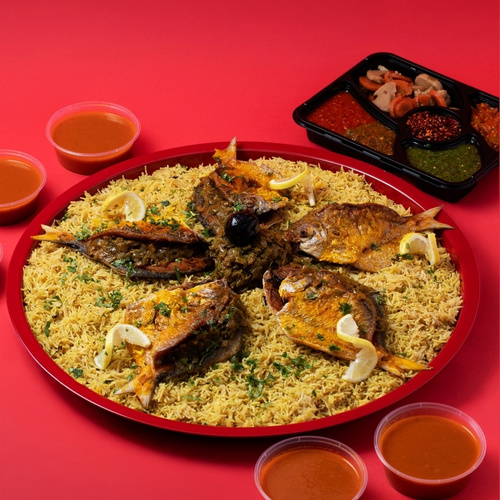 Zubaidi Mtabbag Tray - Zubaidi Mtabbag tray served with fish rice, Zubaidi fish, Daqoos, five varieties of Mabooj, and Achar