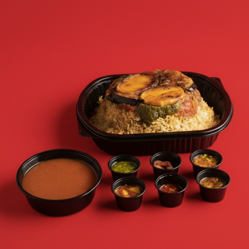 Emberech - Meat Maqluba - Meat Maqluba made with mixed vegetables and tender, carefully cooked meat (Australian or Arabic), flipped and served over white rice for a rich, irresistible flavor.