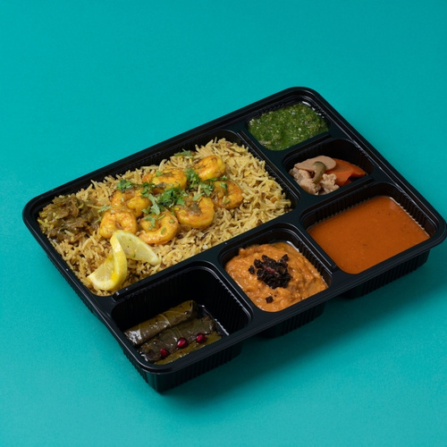 Moumawash Shrimp [Saving Meal] - Mash (lentil) rice with shrimp, served with Jareesh, Vine Leaves, Daqoos, Mabooj, and Achar