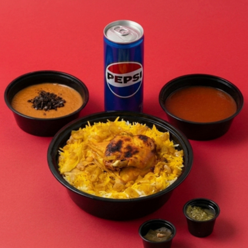 Chicken Machboos Combo - chicken machboos dish with a quarter chicken, served with daqous sauce and Kuwaiti stuffing, plus an appetizer of your choice and a soft drink