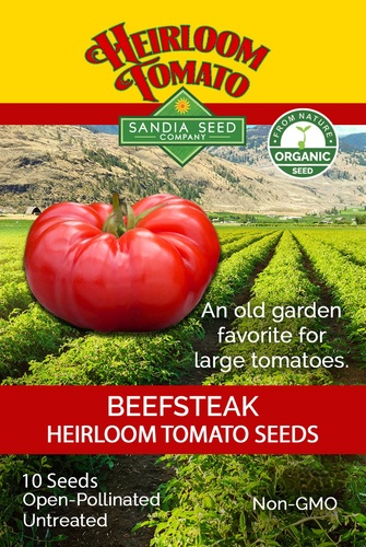 Tomato Beefsteak Organic giant / Sandia - Vigorous tomato with exceptional disease resistance, succulent flavor, and enormous fruit size.  This huge red beefsteak tomato is meaty and tastes both mild and sweet. Great for sandwiches. Our summertime favorite is the BLT with one thick slice of this tomato. This indeterminate plant can grow very tall and needs a cage or tie to a stake for support. A dependable big tomato with intense flavor. Organic, Open-pollinated heirloom (90 days)  Plant Habit: Indeterminate. Plant Size: 6-8’. Fruit Color: Red Shape: Flattened globe. Size:12-16 oz.   10 seeds