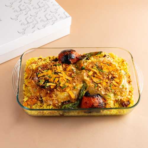 Kebab Rice Pyrex - 10 pieces of kebab in layers of saffron rice served with 2 sauces and 2 cucumber yoghurt