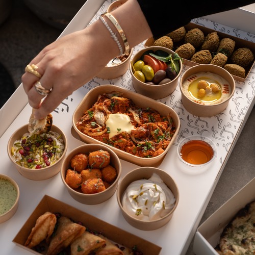 BREAKFAST BOX - Breakfast box : ( 5 - 6 person )&nbsp; Falafel with tahina sauce - mix samboosa with chatni sauce - foul - hallumi bites - feta cheese with walnut - hummus - labna with pamogranate and pistachio topping - cream with honey - mix vegetable - olives )&nbsp; Delivery time till 12pm