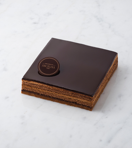 Opéra entremets      NOTE: 1 DAY BEFORE DELIVERY - Celebrate any occasion with one of the greatest French classics, a larger famous Opéra pastry created for your gatherings and made with Almond biscuit soaked in coffee, crunchy praline biscuit, and light coffee and milk chocolate&nbsp;mousse