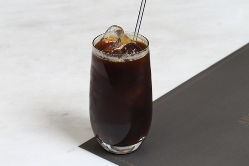 Iced coffee - full
  glass of ice and double shot espresso