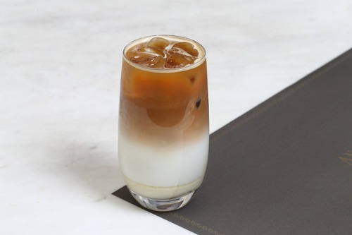 Iced spanish latte - condensed
  milk, vanilla syrup, fresh milk and double shot espresso
