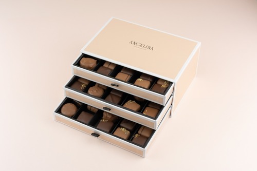Chocolate box - 60 pieces - Angelina offers a variety of delicious chocolate in its elegant box with your choice of different flavors, GIANDUJA LIME, GIANDUJA PRALINE, HAZELNUT PRALINE, RED ROSE, RED HEART, CARDAMOM, NEROLI, CARAMEL COULIS, ALMOND SESAME, DARK CHOCOLATE GANACHE, HAZELNUT BONBON
