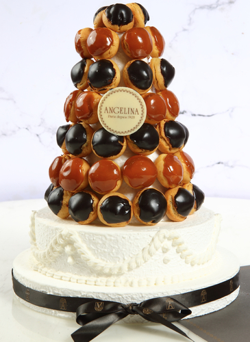 Éclair pyramid - 2 days before delivery - Share this Delicious choux pastry&nbsp;pyramid,&nbsp;with creamy filling chocolate or caramel cream,&nbsp;with your friends and family and create sweet moments on your happy occasions.