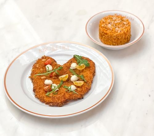 Chicken Milanaise & Puntalette Risotto - Chicken breast breaded ,basil,cherry tomato, mozzarella cheese, Arugula