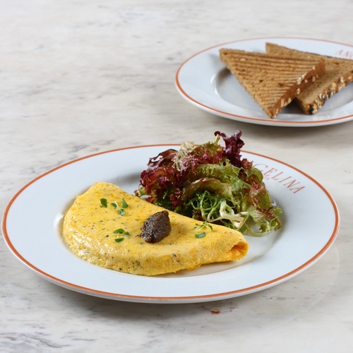 Truffle omelette - Confit truffles brunoise, mixed salad.&nbsp;Served with multigrain toasts.