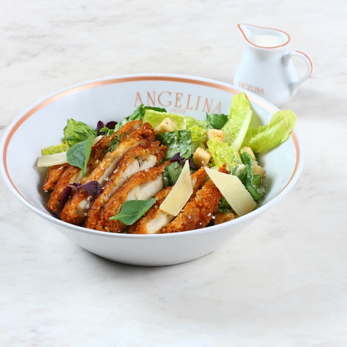CHICKEN CAESAR SALAD - Breaded chicken, Parmesan, toasted croutons, romaine lettuce, Caesar dressing.