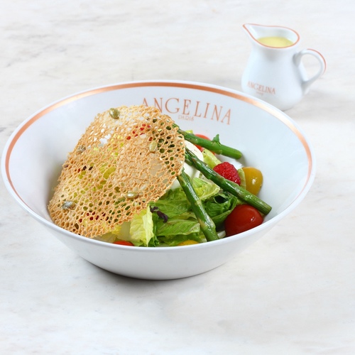 Burrata Salad - Burrata cheese, zebra and cocktail tomato, raspberries, romaine lettuce, buckwheat pancake, lemon vinaigrette.