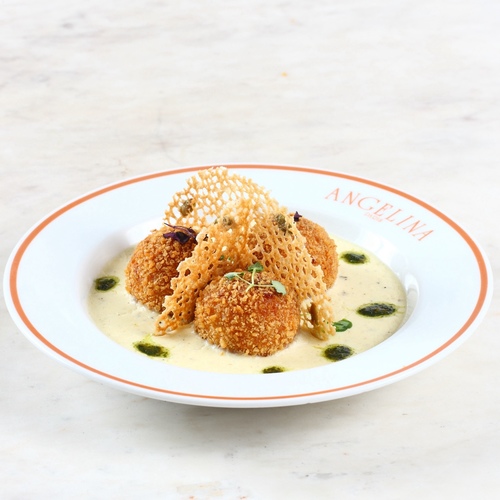 Truffle Arancini - Creamy truffle&nbsp;and&nbsp;pesto sauce.
