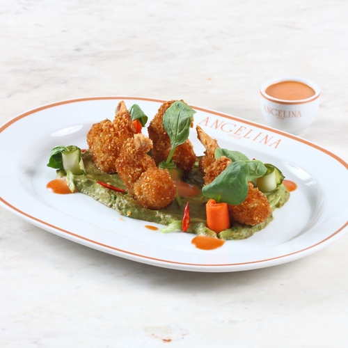 Sesame crusted shrimps - Breaded shrimps, cucumber pickles, avocado dip, cocktail sauce.