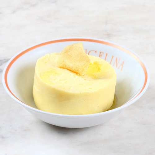 Mashed potatoes - this ultra-creamy mashed potato is rich in flavors, made with mashed potatoes, cooking cream, parmesan cheese, salt, black pepper powder, shredded mozzarella cheese, Emmental Cheese, and served with potato chip.