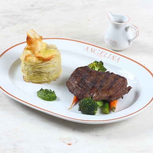 Beef tenderloin - Black Angus tenderloin cut,&nbsp;fresh vegetables, green pea purée, gratin dauphinois and mushroom sauce.