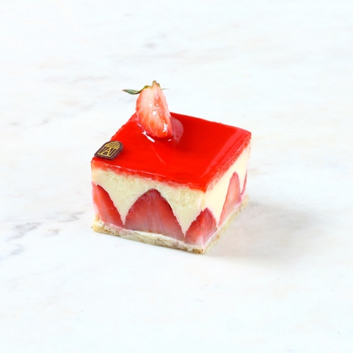 Fraisier - Enjoy sweetness&nbsp;of&nbsp;our Frasier,&nbsp;which&nbsp;combines the freshness of strawberries, the sweetness of&nbsp;light&nbsp;vanilla cream, and the texture of a hazelnut biscuit and pastry&nbsp;cream