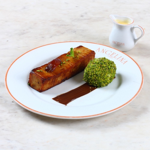 Dates pudding - Served with vanilla ice cream and pistachio.