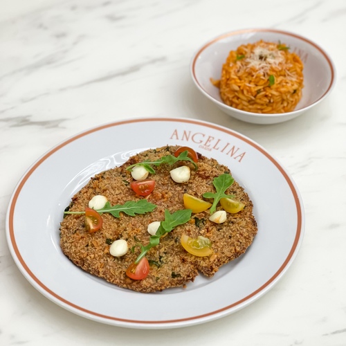 Beef Milanaise & Puntallette Risotto - Thin Black Angus breaded tenderloin, basil, cherry tomatoes, burratina cheese, arugula. Served with puntalette pasta risotto, tomato sauce, parmesan