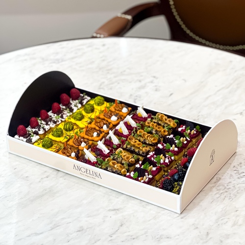 Special Canapés Box - 1.Mini Brioche Mix Berry Description:
- Mix Berry Sauce&nbsp;- Brioche bread- pistachio Crumble- &nbsp;raspberry&nbsp;- &nbsp;Blue berries- &nbsp;Black berry- red currant
2.Mini Brioche Labneh:&nbsp;&nbsp;- Brioche bread&nbsp;- Labnah&nbsp;- raspberry&nbsp;- Dried Berries- Dried Berries Sauce- Cress Shiso
3.Mini Brioche Muhamara:
- Brioche bread&nbsp;- muhamara- Camremelized walnut&nbsp;- red bell pepper&nbsp;- cream cheese- Cress Shiso&nbsp; &nbsp;4. Mini Brioche Hummus Beetroot&nbsp;
- Brioche Bread&nbsp;- Beetroot Hummus- beetroot&nbsp;- pomegranate&nbsp;- feta cheese- pine nut&nbsp;
5.Mini Brioche Beetroot Hummus Feta
- Brioche Bread- beetroot Hummus&nbsp;- feta cheese- cheakpeas- pomegranate&nbsp;- cress Shiso&nbsp;
6.Mini Brioche Saffron Toast&nbsp;
- Brioche bread&nbsp;- saffron sauce- Mascarpone Cheese- pistachio Crumble&nbsp;- saffron root- cress Shiso
7.Mini Brioche Hazelnut Praline:
- Brioche bread&nbsp;- hazelnut praline sauce- camremelized Hazelnut- Cress Shiso