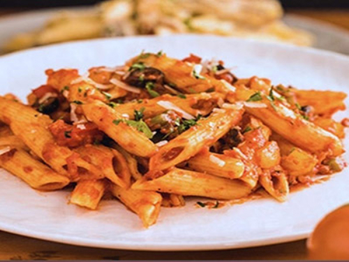 Penne Arrabiata Pasta - Penne pasta, cheese and tomato sauce.