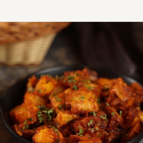 Potato Tawa - Cubes of potatoes cooked with tomatoes and herbs