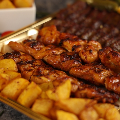 Small Jat Mix Grill - Selection from grills 3 skewer kebab 12 pieces shish tawouk served with Iranian fries and breads