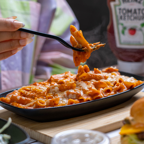 Shrimp Great Pasta - Little spicy, spiral pasta, Shrimp, garlic, mozzarella cheese, parmesan cheese, spices, and Red and white sauce mix.