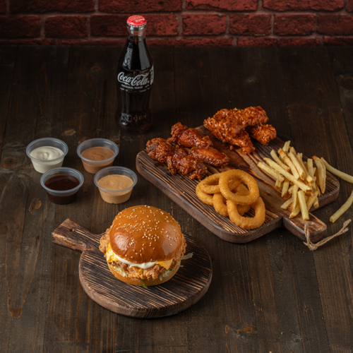 Mix Box Meal - Mix box meal consists of your choice of 1 sandwich, with 3 pieces of buffalo chicken tender, 5 pieces of crispy onion rings, 4 pieces of hot chicken wings, and 1 classic fries, and your choice of drink, and 4 types of sauces.