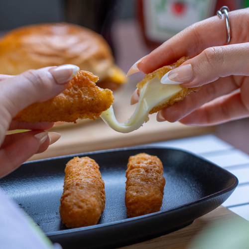 Mozzarella Sticks - Breaded Mozzarella Stick, served with spicy chipotle sauce.