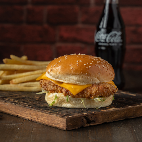 Crispy Chicken Meal - Fresh potato bun, mayonnaise, cheddar cheese, tomato, lettuce.