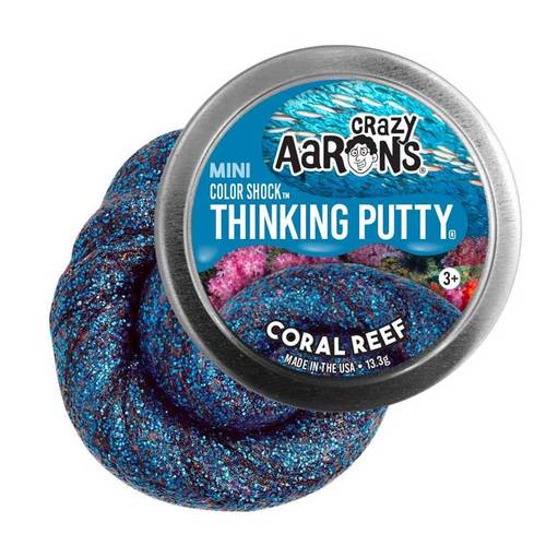 CRAZY AARON'S MINI CORAL REEF-2 INCH THINKING PUTTY - The mystery of the deep. Coral Reef starts out as a sea of sparkling 
blue, but its color shock technology holds a surprise inside. Stretch 
this putty in the light to reveal a coral pink just beneath the surface. Thinking Putty® helps build hand and finger strength through a 
fabulous tactile play experience with unique, unexpected properties and 
provides relaxing, yet stimulating interaction for anyone with sensory 
integration issues. Crazy Aaron's putty is non-toxic, won't dry out, and won't leave a 
sticky or slippery residue on your fingers, so it's great for 
stretching, molding, bouncing, tearing, popping and playing by kids and 
adults alike. 



Collection: Color Shock | MINI
Includes mini tin with 1/34 lb. (0.47 oz) of putty
Color: Blue glitter that shimmers pink 
Features: Sparkle, Stretchable, Sculptable, Soft Texture
Materials: Non-toxic silicone
Ages: 3+
⚠️ Warning: Choking Hazard. Contains Small Parts
Never dries out
Proudly made in the USA
Manufactured with the help of exceptional individuals with disabilities