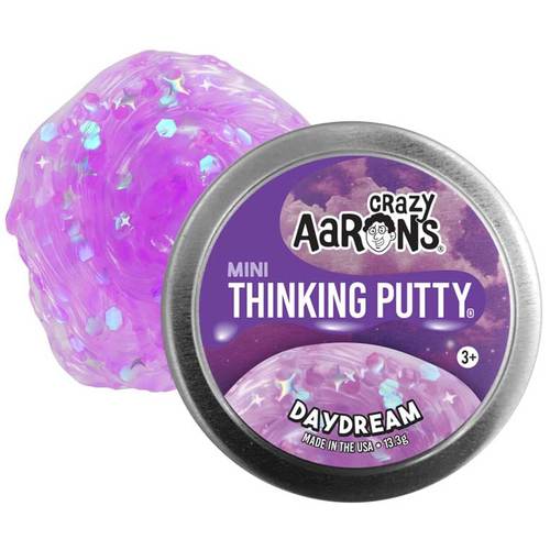 CRAZY AARON'S SCENTSORY DAYDREAM 2.75 IN THINKING PUTTY - Thinking Putty® helps build hand and finger strength through a 
fabulous tactile play experience with unique, unexpected properties and 
provides relaxing, yet stimulating interaction for anyone with sensory 
integration issues. Crazy Aaron's putty is non-toxic, won't dry out, and won't leave a 
sticky or slippery residue on your fingers, so it's great for 
stretching, molding, bouncing, tearing, popping and playing by kids and 
adults alike.
 



Collection: MINI
Includes tin with 1/34 lb. (0.47 oz) of putty
Color:  Translucent lavender with sparkles and stars
Features: Sparkle, Stretchable, Soft Texture
Materials: Non-toxic silicone
Ages: 3+
⚠️Warning: Choking Hazard. Contains Small Parts
Never dries out
Proudly made in the USA
Manufactured with the help of exceptional individuals with disabilities