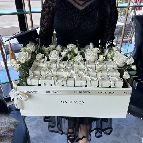 Giveaways- GD 2 - 24 pcs of mix high end Belgian chocolate with our special arrangement of fresh roses and decorated with a graduation hat with the name printed on each box 
 If you choose - write your name -, please write the name in the comments box below