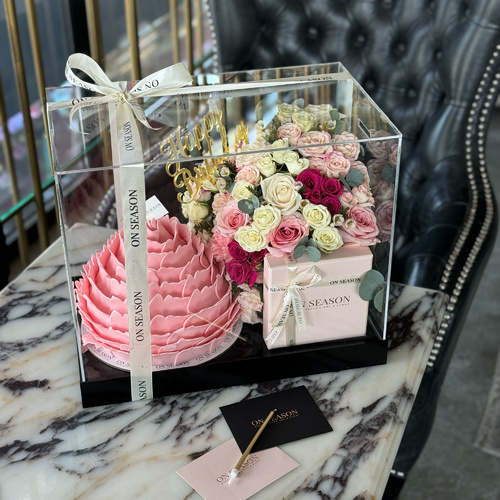 Package - A - beautifully designed special acrylic box that includes a Pink Floral Cake,200g of chocolate with a set of beautiful roses.