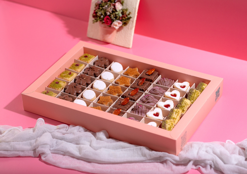 Paris sweets - A selection of petit four sables and cocoa The box contains 40 pieces