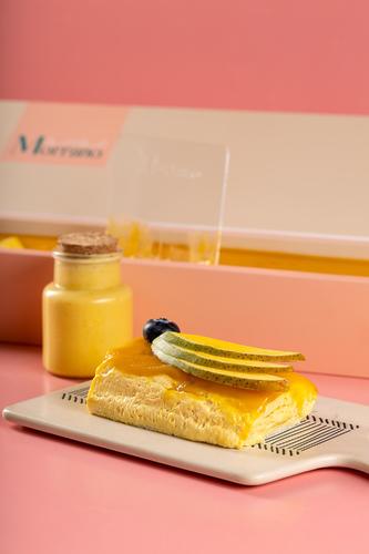 Alphonso Cakecx - Mango Mousse Cake with fresh mango pieces and smoothie sauce Weight 1 kg