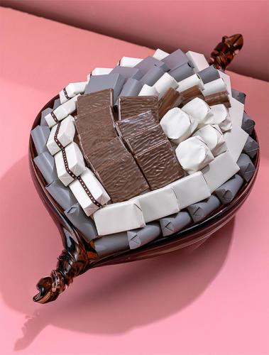 2815 Oval Gray - Swiss chocolate with caramel filling 
  66 pieces