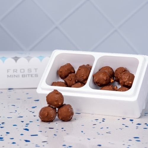 Mini Kinder Bites - 12 pieces of mini ice cream Kinder bites, filled with rich Kinder pieces, coated in premium Belgian chocolate, and topped with crunchy roasted almonds