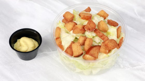 Caesar Salad - Fresh lettuce, parmesan and croutons with caesar dressing.