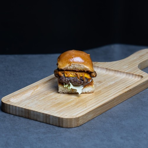 Clucks & Ribecca Restaurant - burger slider - Single grilled beef patty, cheddar cheese, lettuce, tomato, pickles, Onions, c&r sauce.